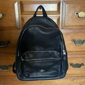 Coach Leather Backpack with Gold Hardware and Front Pocket (small white stain)
